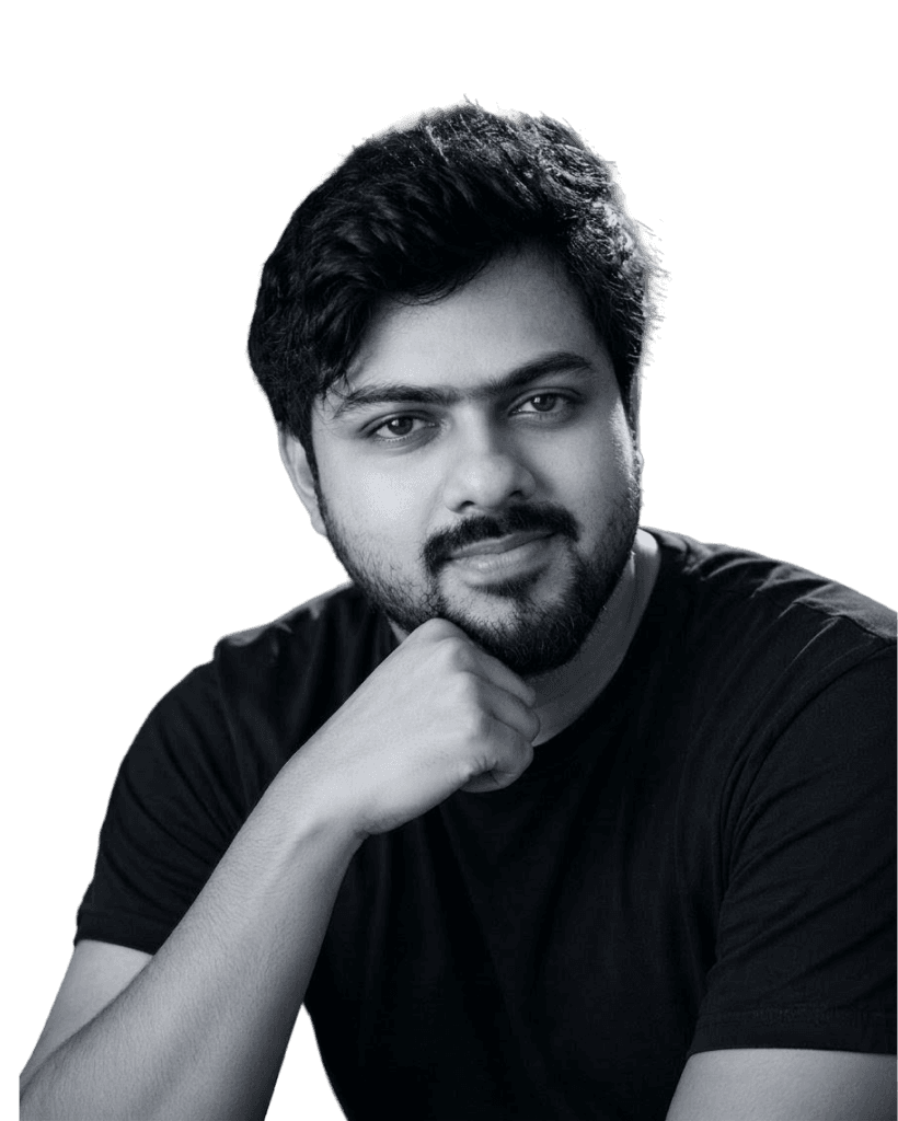 Pankaj, chin on fist, in a black T-shirt